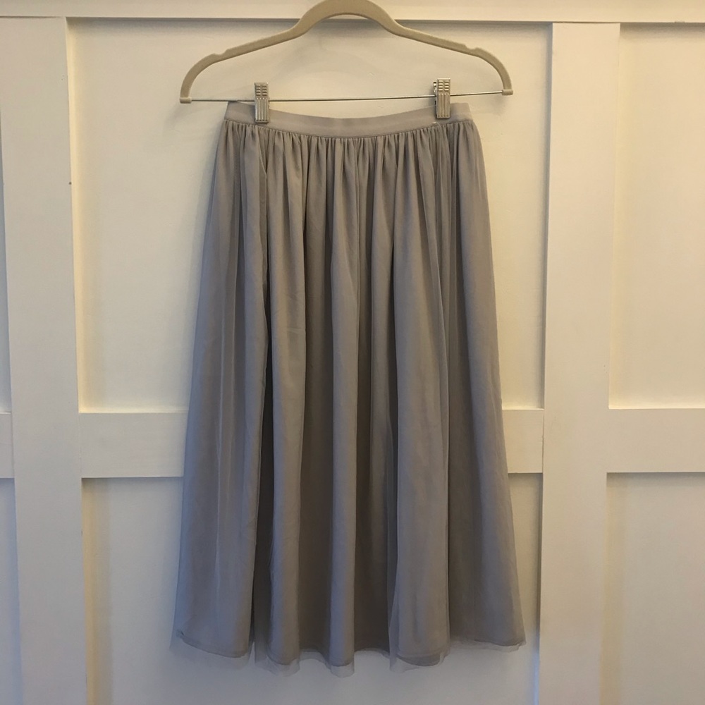 Grey tulle knee length skirt.
